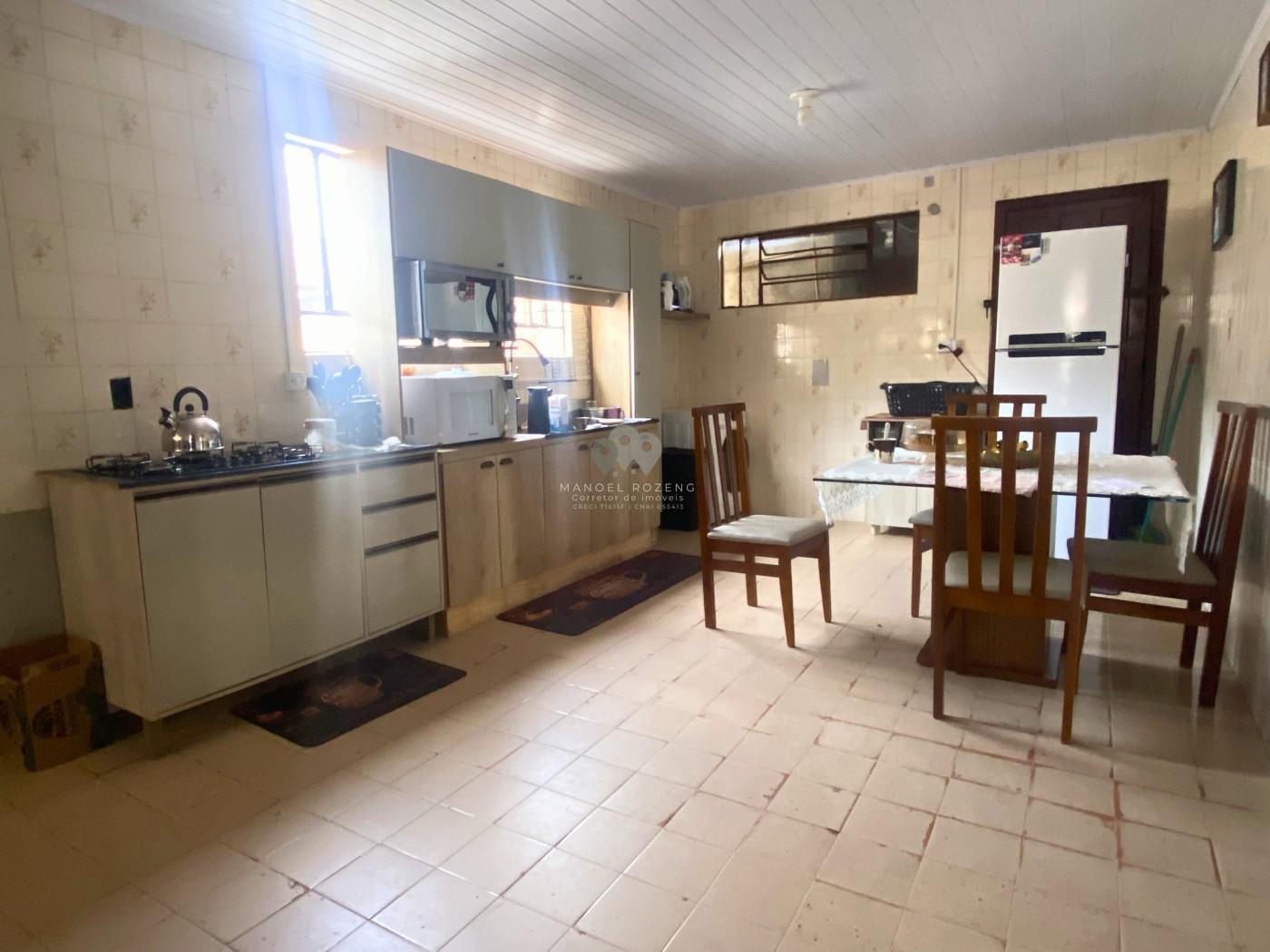 IMÓVEL COM RENDA ATIVA + AMPLO TERRENO DE ESQUINA  BAIRRO SANGÃO - Manoel Rozeng